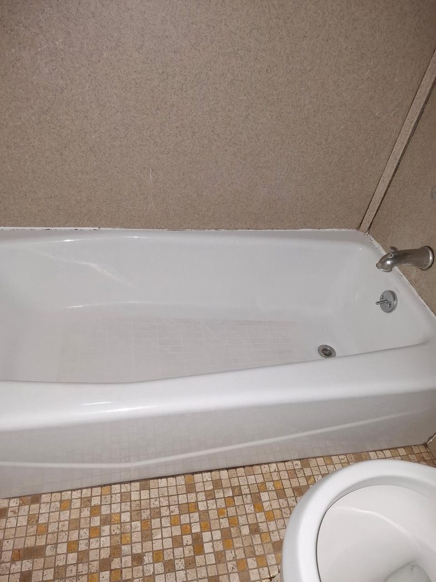 bathtub and tile floor